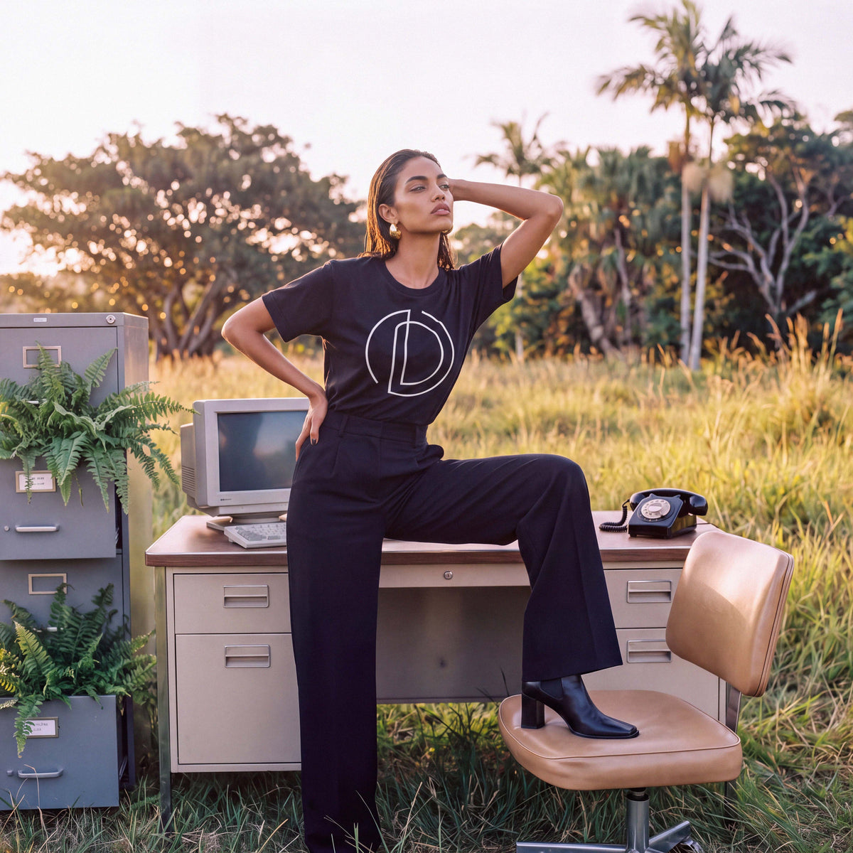 The black AMAYA organic cotton tee shown on the body for fit – Oldest Daughter, Byron Bay