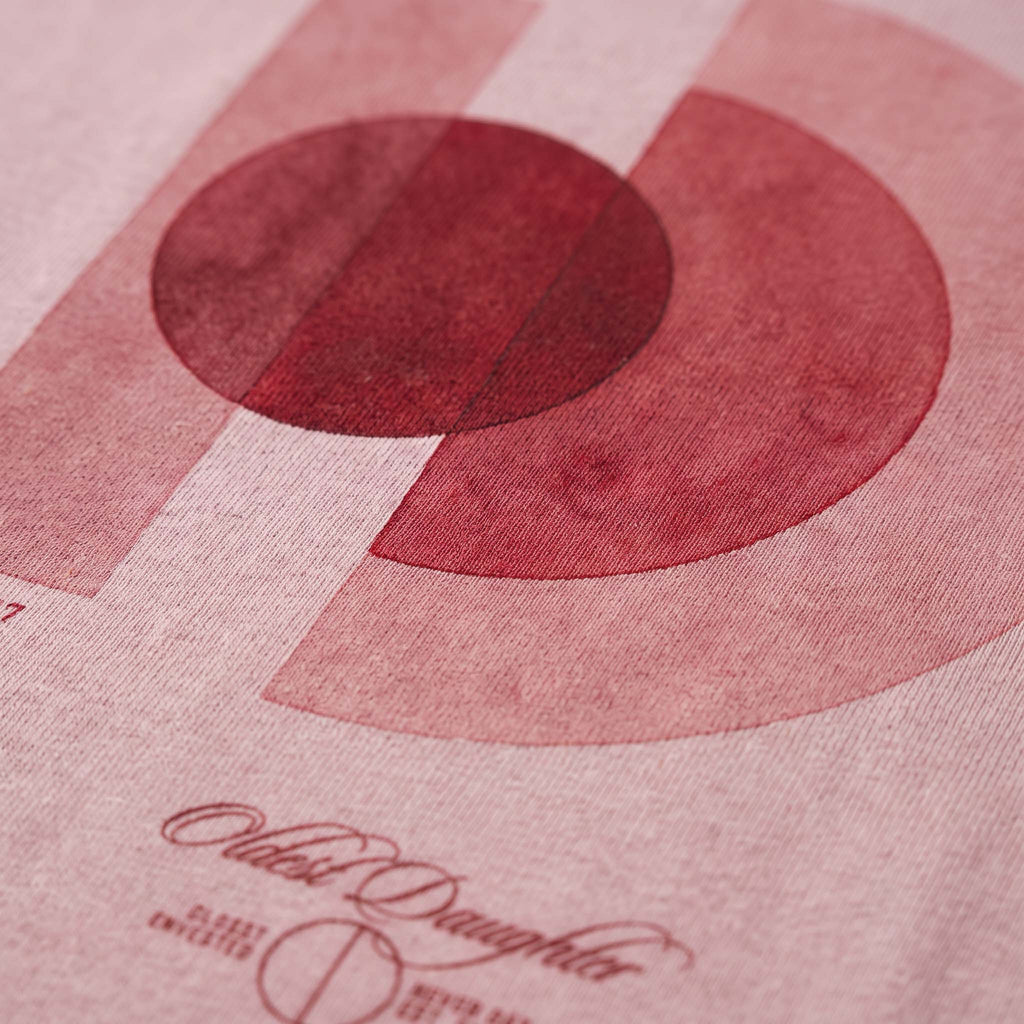 Detail of the overlapping watercolour shapes in the AYLA print, soft water-based ink on blush cotton – Oldest Daughter