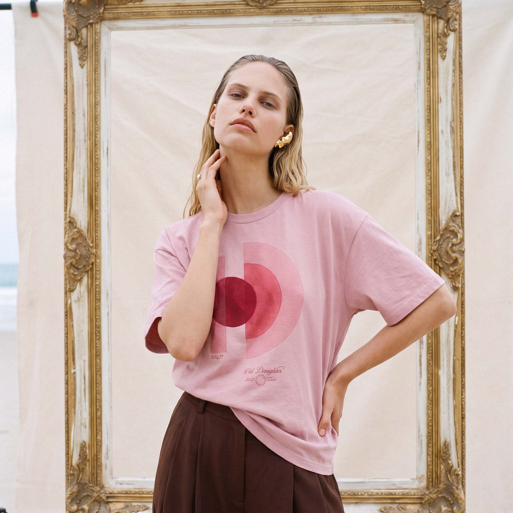 AYLA blush organic cotton tee worn relaxed, showing the drape of the lightweight 155gsm jersey – Oldest Daughter