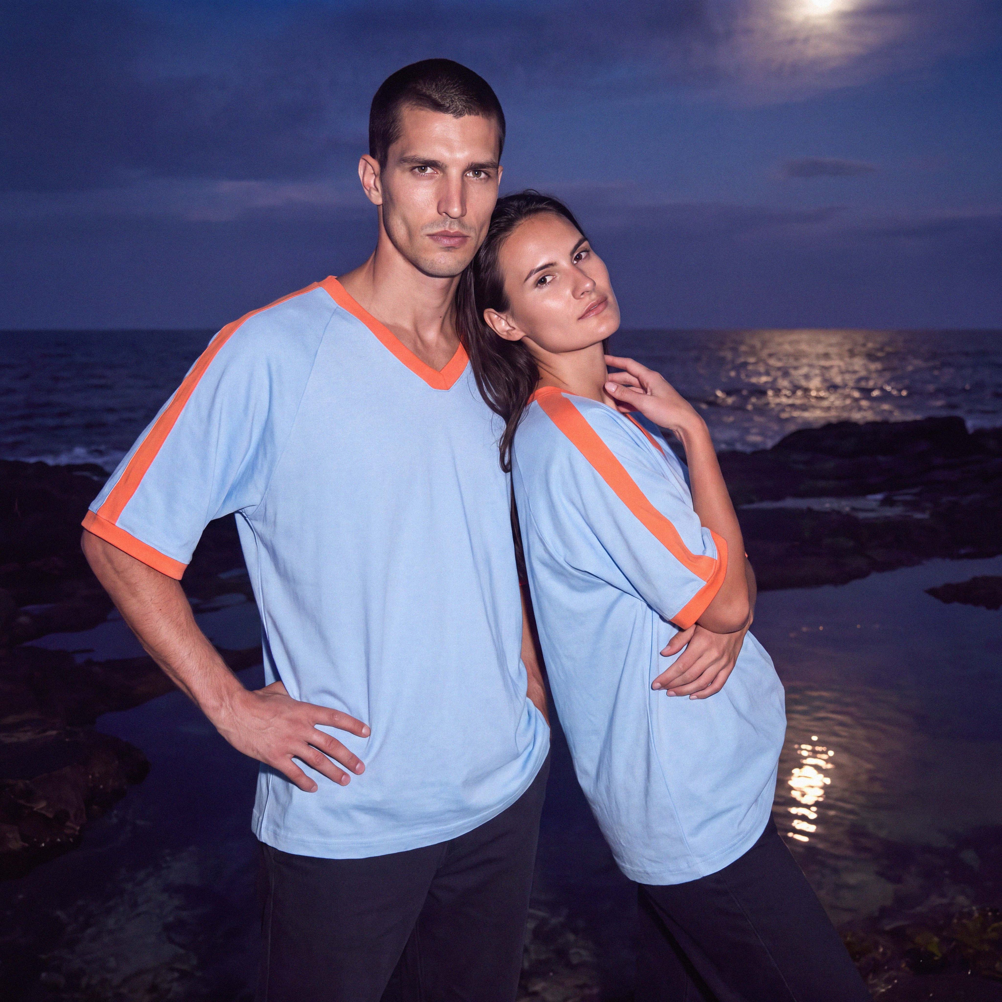 Half-length view of the sky blue BODHI organic cotton V-neck tee – Oldest Daughter