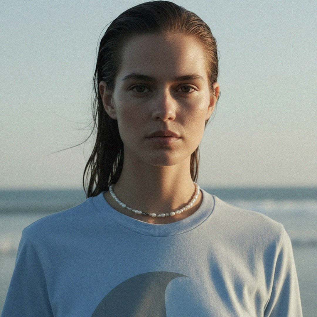 PRE-ORDER: 'Baby Not Blue' certified organic (basic) tee – milky blue (women) by Oldest Daughter