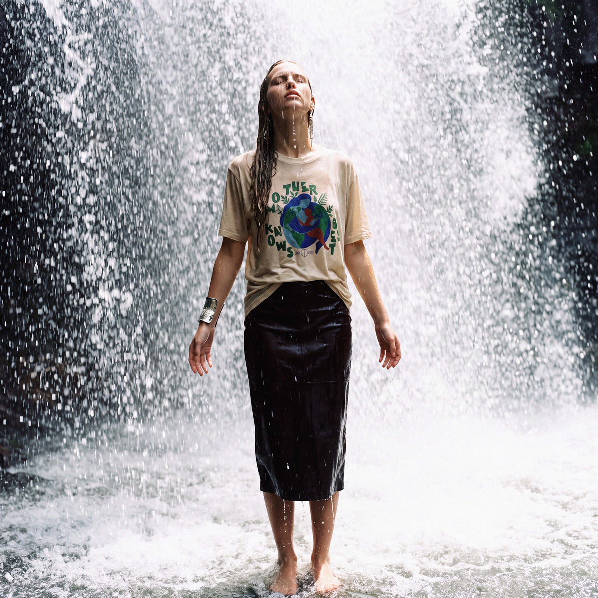 Side view of the EVE antique white oversized slouch boyfriend tee – Oldest Daughter, Byron Bay