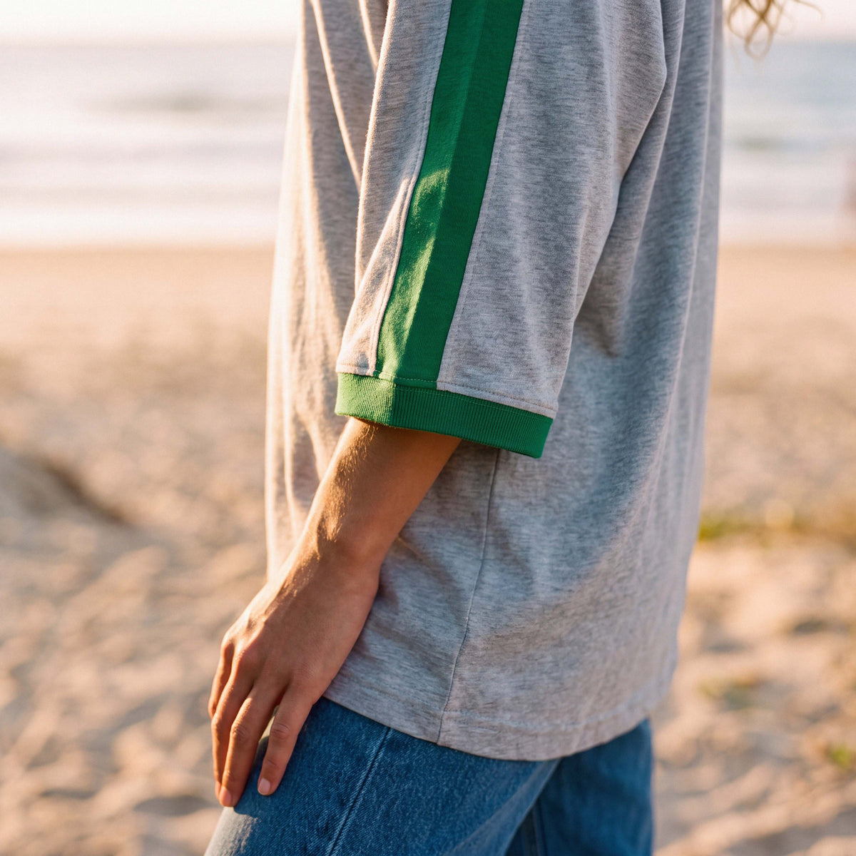 Hem detail of the FLO extra-oversized organic cotton tee in grey marle – Oldest Daughter