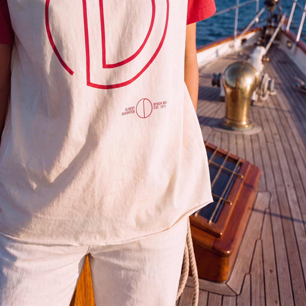 Neckline detail on the marshmallow MABEL organic cotton raglan boyfriend tee – Oldest Daughter